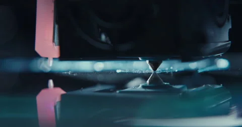 Close ups of a 3D printer moving and printing an object Stock Footage 301832083