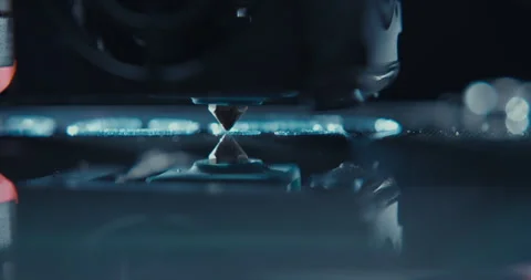 Close ups of a 3D printer moving and printing an object Stock Footage 301832410