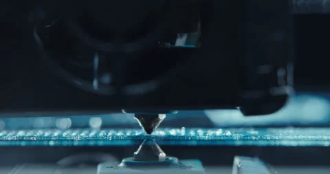 Close ups of a 3D printer moving and printing an object Stock Footage 301832569