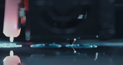 Close ups of a 3D printer moving and printing an object Stock Footage 301832768