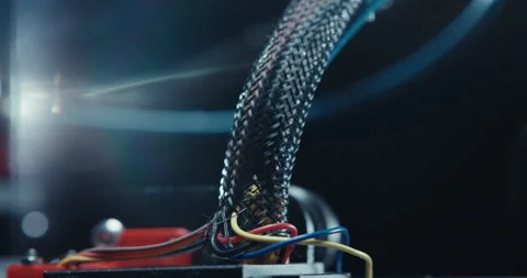 Close ups of a 3D printer moving and printing an object Stock Footage 301834212