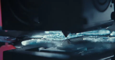 Close ups of a 3D printer moving and printing an object Stock Footage 301834664
