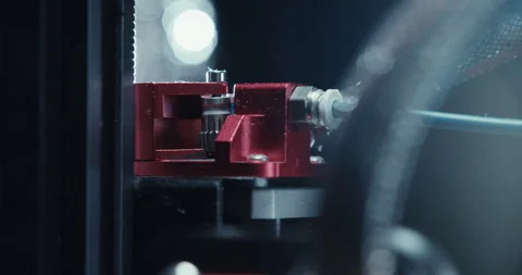 Close ups of a 3D printer moving and printing an object Stock Footage 301835960