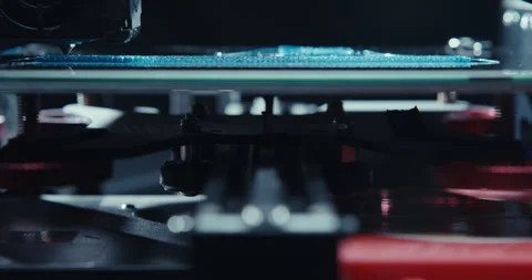 Close ups of a 3D printer moving and printing an object Stock Footage 301839282