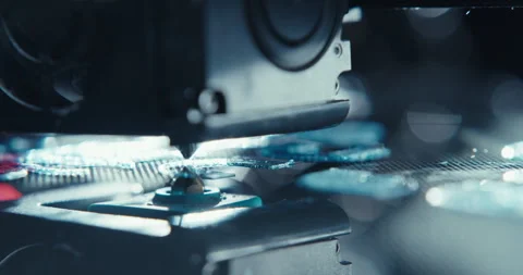 Close ups of a 3D printer moving and printing an object Stock Footage 301839482