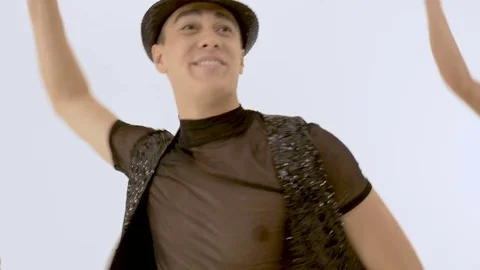Close-ups of actors who sing and dance. They move very beautifully. In studio on Video stock 85389674