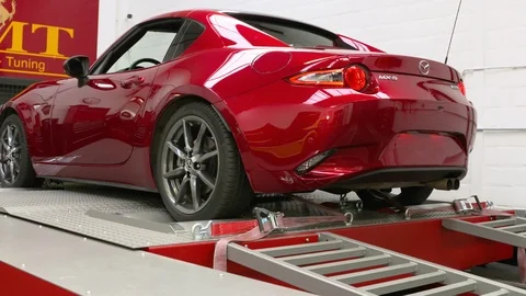 Close ups from a car on a rolling road or dynamometer. Being tested after 스톡 동영상 102872170