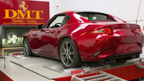 Close ups from a car on a rolling road or dynamometer. Being tested after 스톡 동영상 102872181