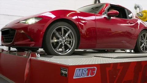 Close ups from a car on a rolling road or dynamometer. Being tested after 스톡 동영상 102872293