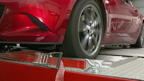 Close ups from a car on a rolling road or dynamometer. Being tested after 스톡 동영상 102872307
