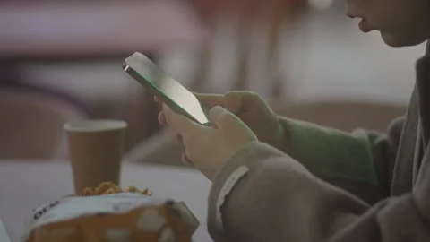 Close-ups of hands holding and using smartphones Stock Footage 325045888