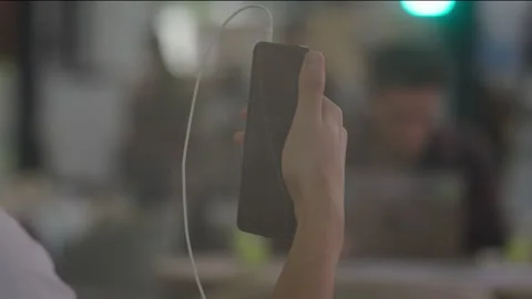 Close-ups of hands holding and using smartphones Stock Footage 325048349