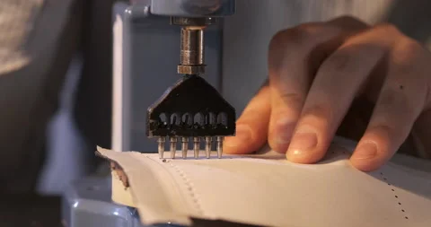 Close-ups of Hole Puncher, Master Tanner Makes Purse in His Home Workshop Stock Footage 133006528