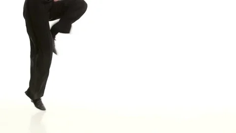 Close ups of legs of dancing man in white studio Stock Footage 75508020