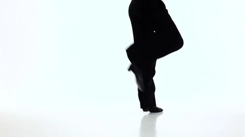 Close ups of legs dancing man. Slow motion, white studio Stock Footage 75550687