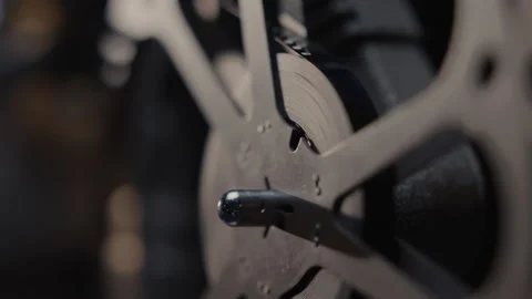 Close ups of a vintage 8MM projector spools moving and playing film Stock Footage 301844931