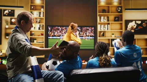 Close up of upset man at home on couch holding mobile phone Stock Footage 338176988