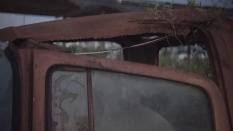 Close upwards motion rusty car Stock Footage 74021586