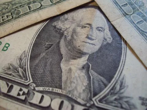 Close-up of US dollar banknotes showcasing currency design. Financial documents Stock Photos