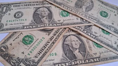 Close-up of US dollar bills showcasing currency and financial assets. Business Stock Photos