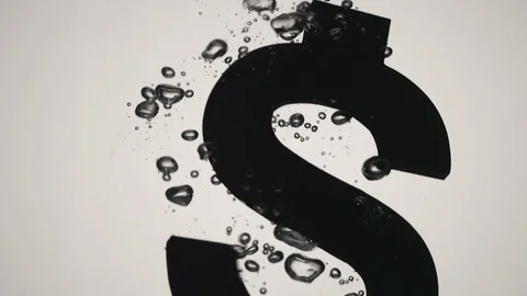 CLOSE UP: US Dollar symbol falls into water - Slow motion Stock Footage 98162783
