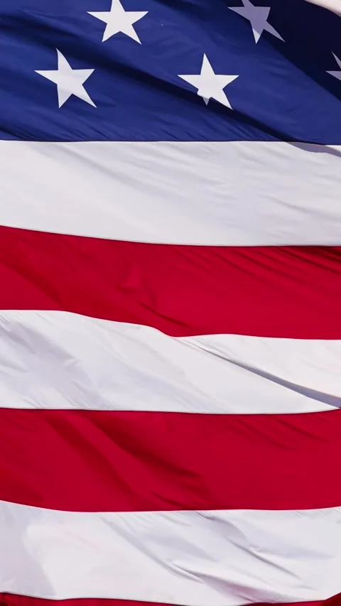 Close up of the US Flag blowing in the breeze 動画素材 285059219