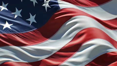 Close-up of the US flag waving in the wind, showing detailed fabric texture Video stock 315554846