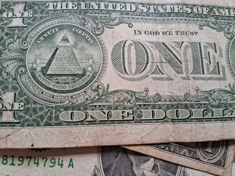 Close-up of US one dollar bills showing detailed currency design. Focused shot Stock Photos