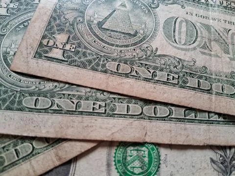Close-up of US one dollar bills showing currency details. Financial documents Stock Photos