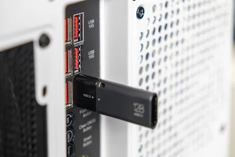 Close-up of USB 3.1 flash drive plugged into USB 10G port on rear IO panel .. Stock Photos