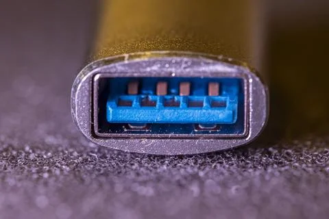 A close up of a USB cable with a blue connector Stock-Fotos