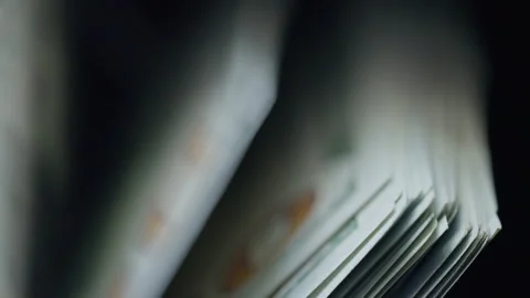 Close-up of USD dollar banknotes counted by a cash counting machine. Perfect for Stock Footage 346495886