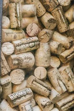 Close-up of used wine corks with printed markings 库存照片