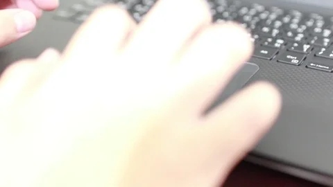 Close up of a user using touchpad (trackpad) of a laptop with bokeh Stock Footage 102190266