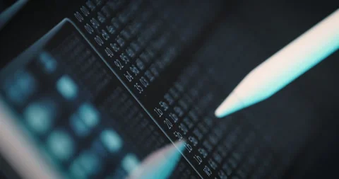 Close-up of user work on tablet screen program code with stylus Stock Footage 248206306