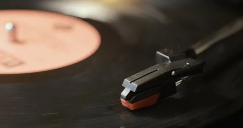 Close-up of using an antiquarian vinyl record player. turntable player,dropping Stock Footage 85857862