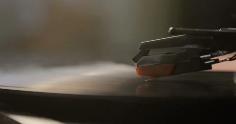 Close-up of using an antiquarian vinyl record player. turntable player,dropping Stock Footage 85864266