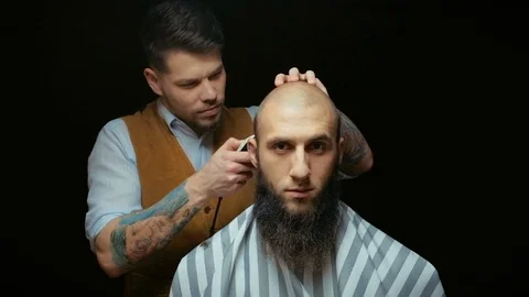 Close-up of a using clippers to shave head Stock Footage 71698840