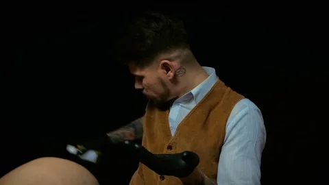 Close-up of a using clippers to shave head Stock Footage 71699182