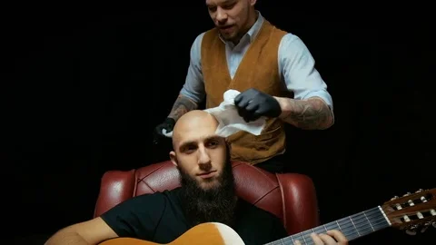 Close-up of a using clippers to shave head Stock Footage 71699543