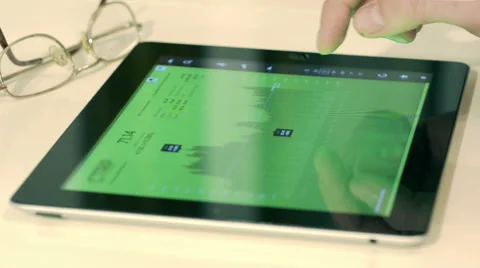 Close-Up Using A IPad To Analyze Statistical Data Video stock 50066228