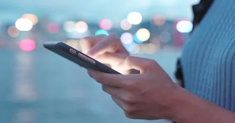 Close up of using smart phone at night Stock Footage