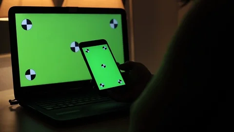 Close up Using Smartphone and Computer With Green Screen - Chroma Key Stock-Footage 127863754