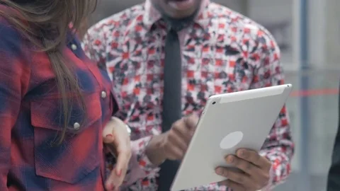 Close-up of using tablet and notebook while discussing the ideas Stock-Footage 73852067