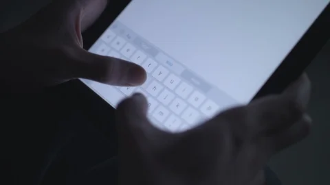 Close up using a tablet in the dark. Stock Footage 86567864