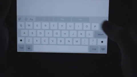 Close up using a tablet in the dark. Stock Footage 86568023