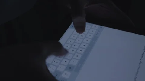 Close up using a tablet in the dark. Stock Footage 86568102