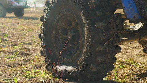 Close-up on a UTV wheel covered in mud Vídeo Stock 344875688