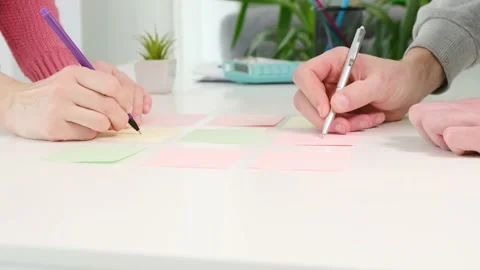 Close up ux developer and ui designer hand brainstorming about Stock Footage 168580490