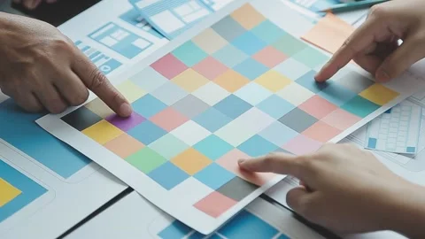 Close up ux developer and ui designer brainstorming about mobile app interf.. Stock Footage 236828021